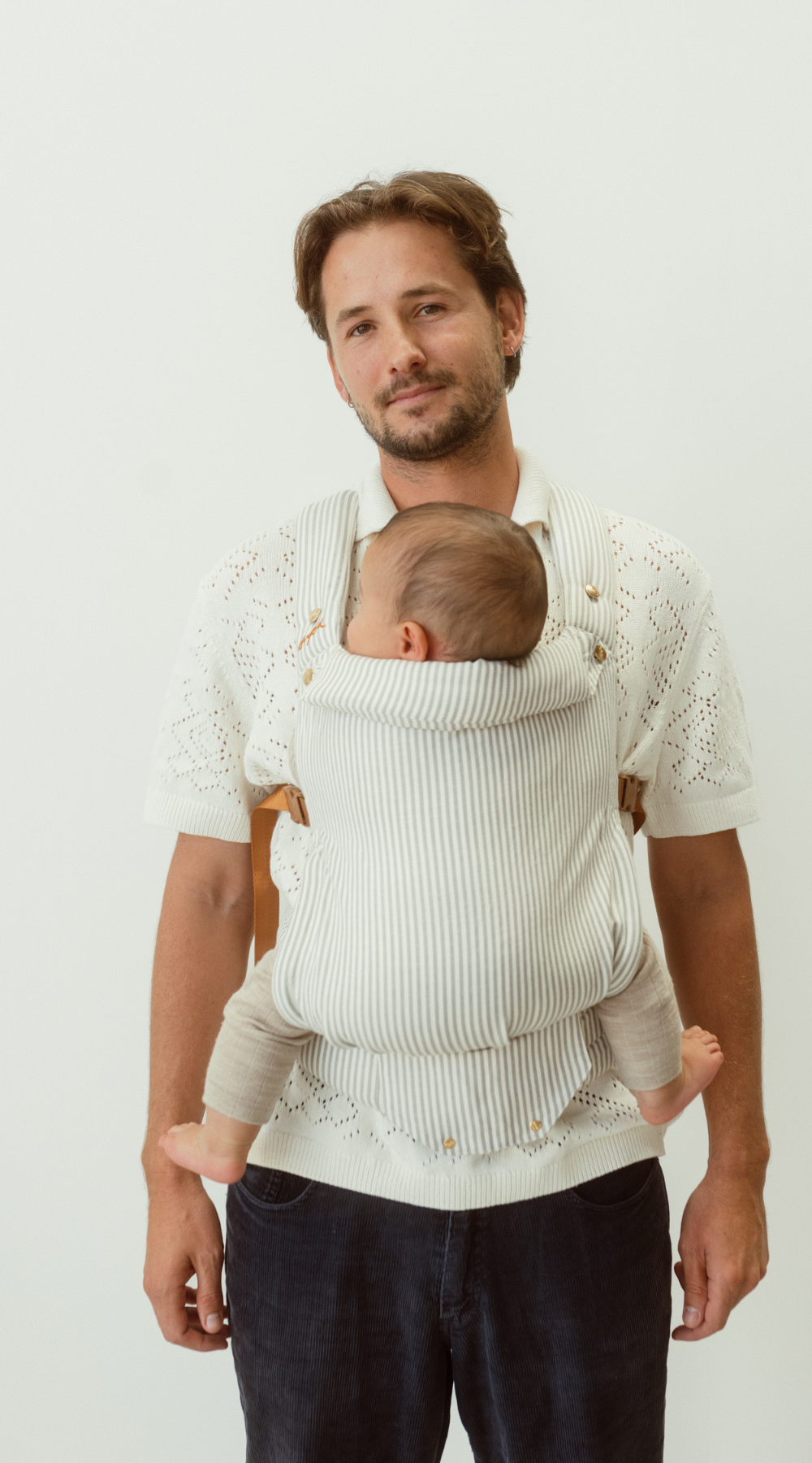 bamboo linen grey stripe baby clip carrier by chekoh australian owned and perfect for newborns and toddlers male babywearing model dad