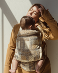 Chekoh Bandana print baby carrier, our new limited edition collection launch 2024. Neutral colours in a stylish bandana paisley print to wear your baby from newborn to toddler. Designed in Australia with super lightweight and cool bamboo and linen fabric blend. 