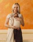 Dune Ring Sling by Chekoh baby, a light sandy beige colour. Perfect carrier for newborns through to toddlerhood. Bamboo and Linen blend and designed in Australia. Chekoh Baby Carriers. 