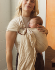 Dune Ring Sling by Chekoh baby, a light sandy beige colour. Perfect carrier for newborns through to toddlerhood. Bamboo and Linen blend and designed in Australia. Chekoh Baby Carriers. 