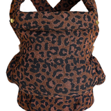 Image of the Leopard Clip Carrier 2.0 by Chekoh Baby - featuring a black, tan and brown Leopard print woven in a Cotton Jacquard including gold hardware.