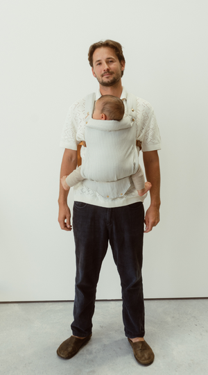 bamboo linen grey stripe baby clip carrier by chekoh australian owned and perfect for newborns and toddlers male babywearing model dad