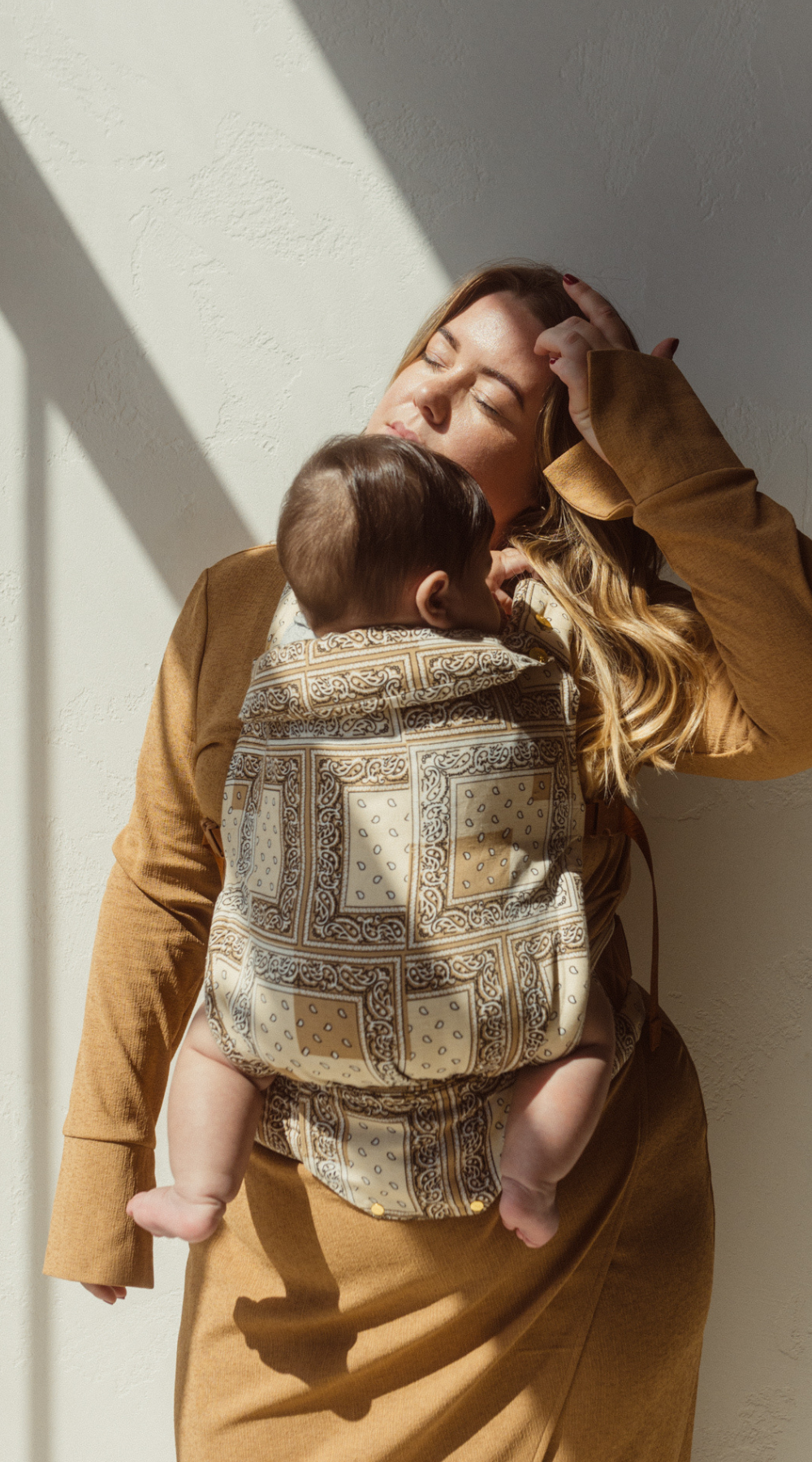 Chekoh Bandana print baby carrier, our new limited edition collection launch 2024. Neutral colours in a stylish bandana paisley print to wear your baby from newborn to toddler. Designed in Australia with super lightweight and cool bamboo and linen fabric blend. 