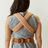 blush coloured baby clip carrier by chekoh australian owned and perfect for newborns and toddlers. Made from natural fibres and size inclusive.