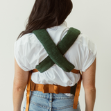 The Moss Clip Carrier 2.0 has soft padded shoulder straps to help alleviate shoulder and back pain when babywearing and the cross back design helps distribute weight evenly as baby grows.