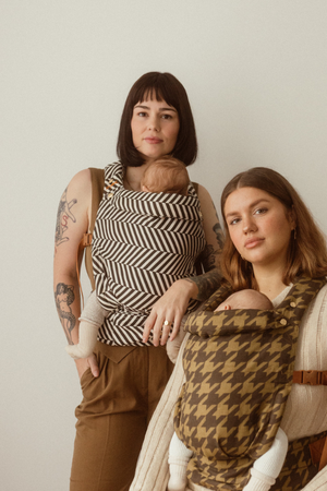 kennedy black stripe chekoh baby clip carrier australian owned and best for newborns up to toddlers for babywearing. NYC new york city collection featuring a black and cream chevron stripe pattern.