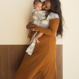 Chekoh Baby Carriers Newborn Wrap Carrier in Bandana print. Neutral colours in beige, cream and ochre for the most perfect style. 
