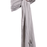 A soft neutral grey toned Asha Ring Sling Carrier by Chekoh Baby on a white backdrop.
