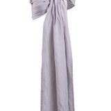 A ghost image of the best-selling Grey Stripe Ring Sling by Chekoh Baby. The linen and bamboo fabric is woven with a grey and white stripe throughout. Featured on a white backdrop for contrast. 