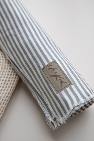 baby newborn swaddle swaddles soft bamboo child essential babyshower gift shower sprinkle spandex stretchy nursery must have swaddled australian aussie eco gender neutral unisex grey gray boy girl