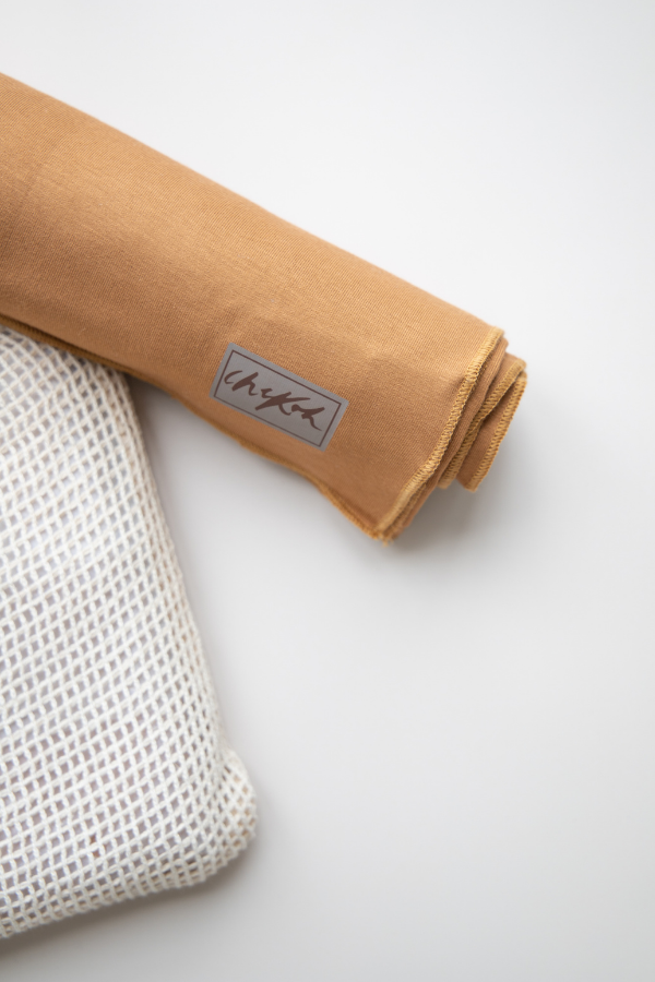 baby newborn swaddle swaddles soft bamboo child essential babyshower gift shower sprinkle spandex stretchy nursery must have swaddled australian aussie eco colour color gender neutral unisex boy girl rich earthy golden tone ochre earth clay aesthetic brown