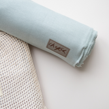 baby newborn swaddle swaddles soft bamboo child essential babyshower gift shower sprinkle spandex stretchy nursery must have swaddled australian aussie eco colour color gender neutral unisex boy girl seafoam green teal blue green gentle